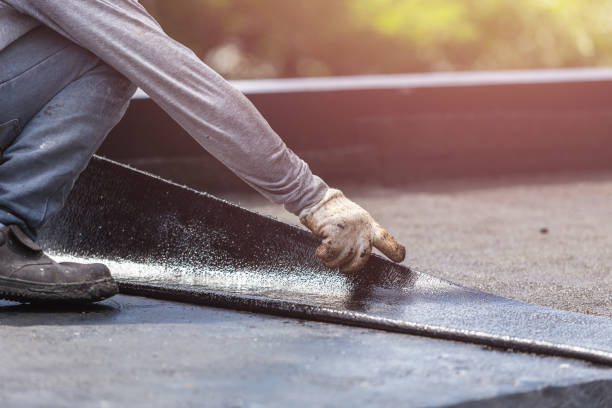 Professional Basement Waterproofing technician working in Springfield, KY